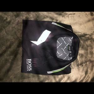 Men’s Hugo boss polo shirt. Black and green trim